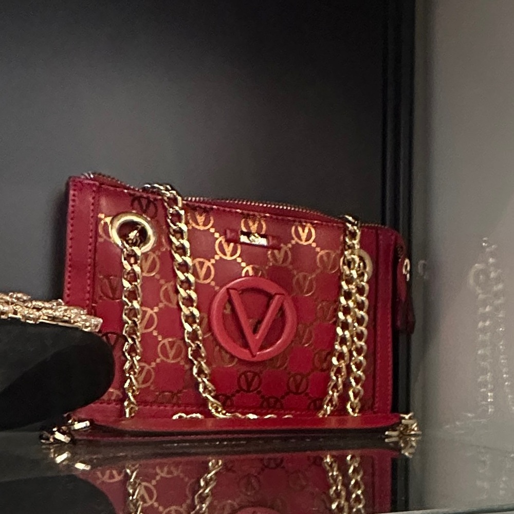 Valentino Luxury Handbag with Gold Accents - Picture 8 of 8